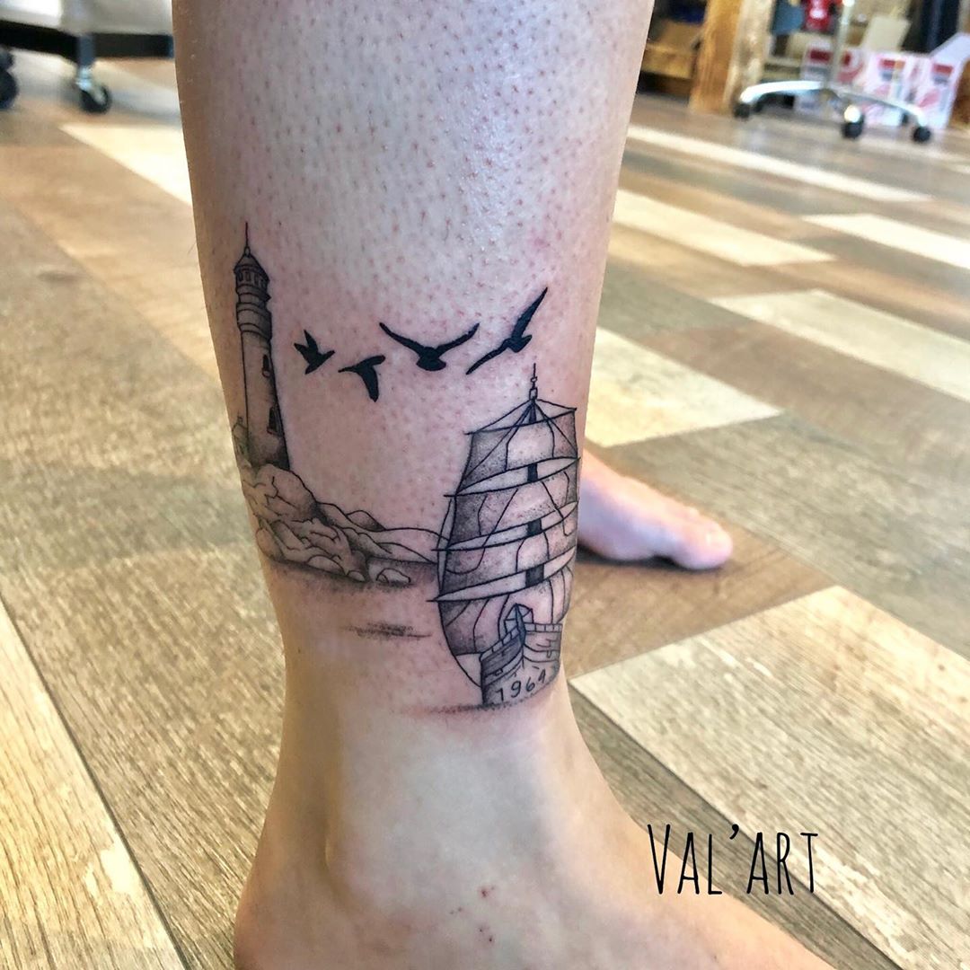 Lighthouse Sailing Ship Tattoo