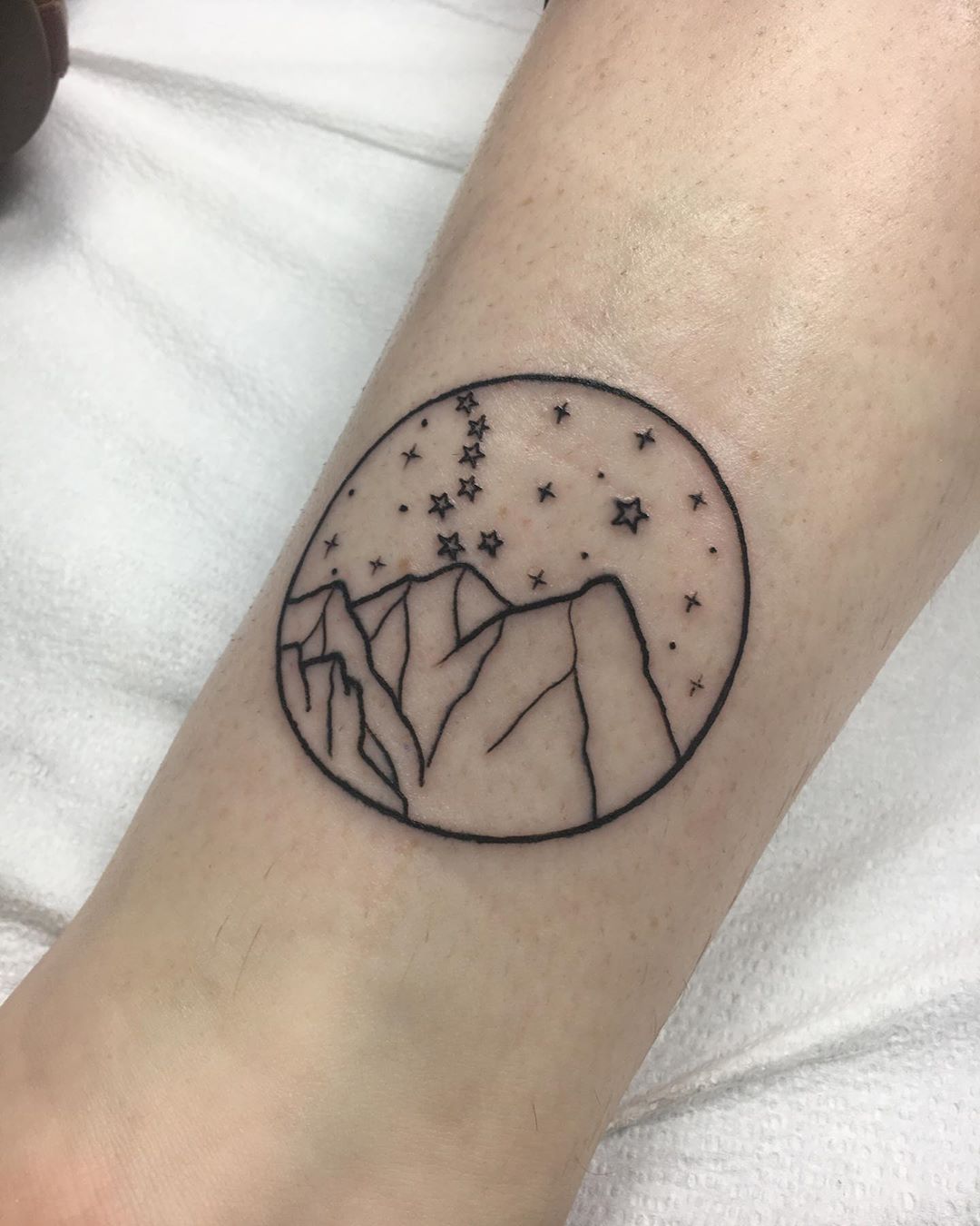 Star mountains tattoo