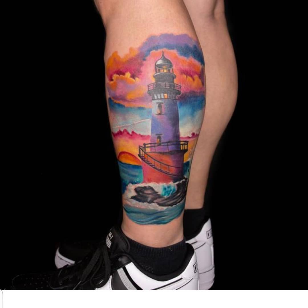 Lighthouse Calf Tattoo with Sunset