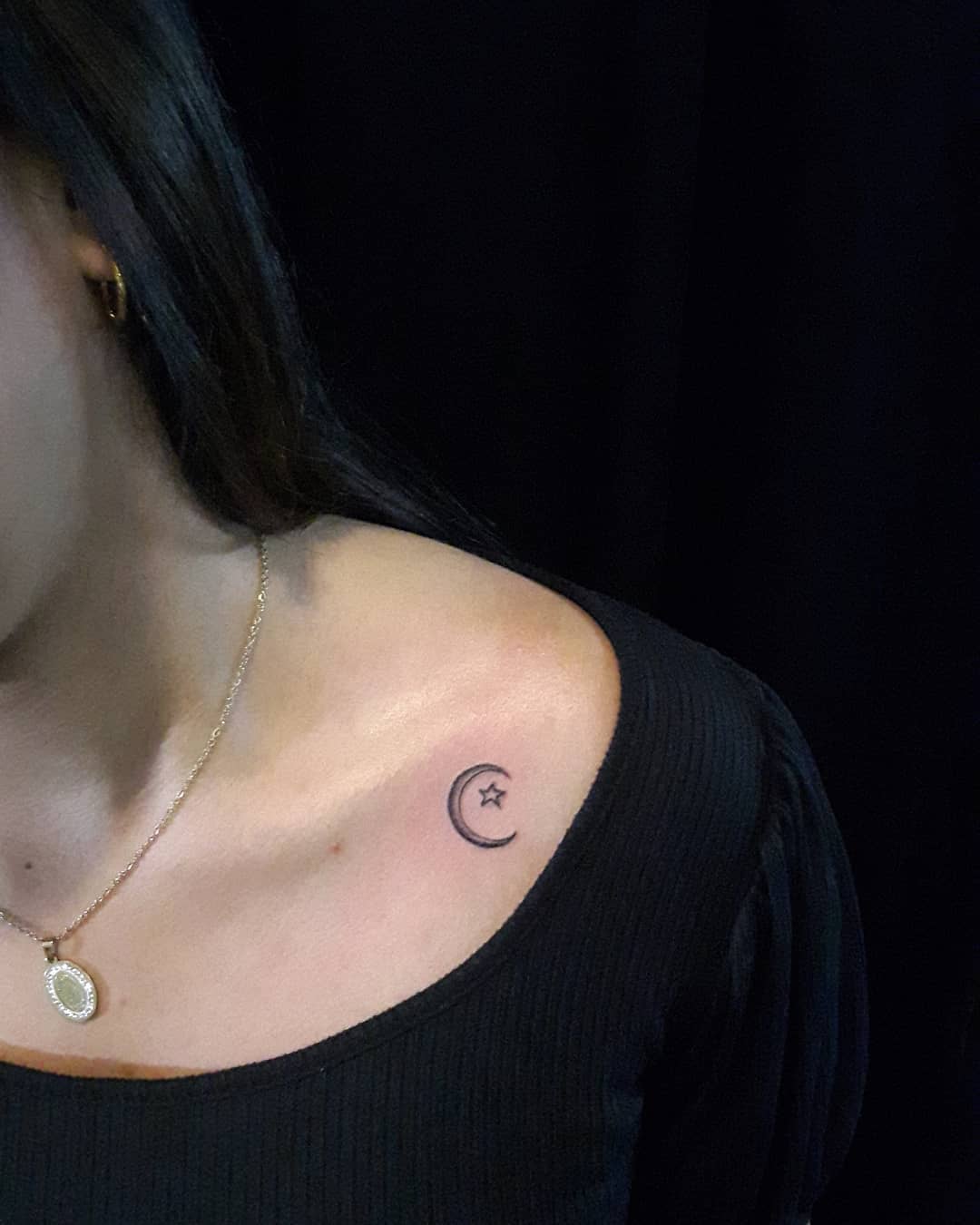 Star and moon tattoo