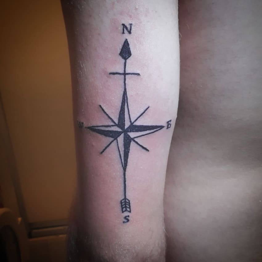 Star compass tattoo