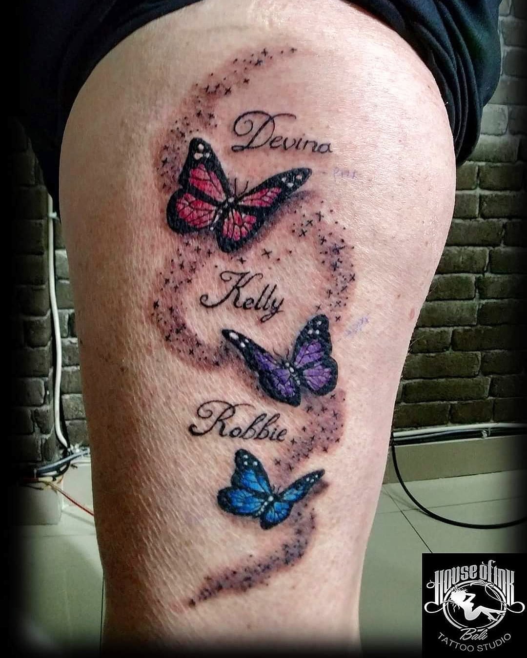 Butterfly and stars tattoo