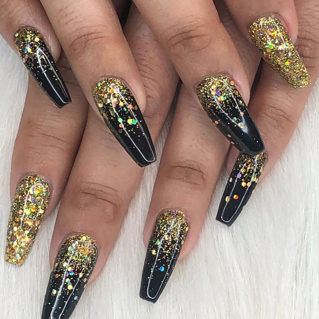 Chic black and gold nail design