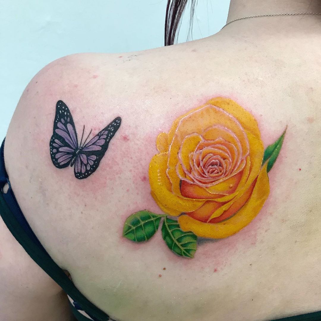 rose and butterfly shoulder tattoo for women