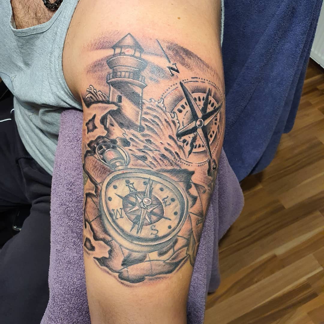 Compass and Lighthouse Sleeve Tattoo