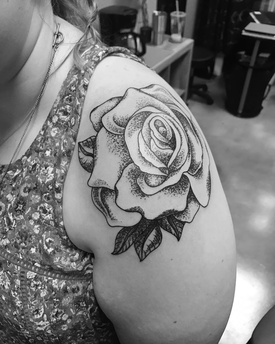 Rose with speckles in a tattoo
