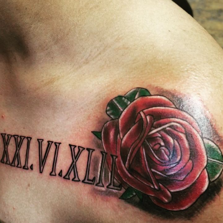 Traditional rose shoulder tattoo