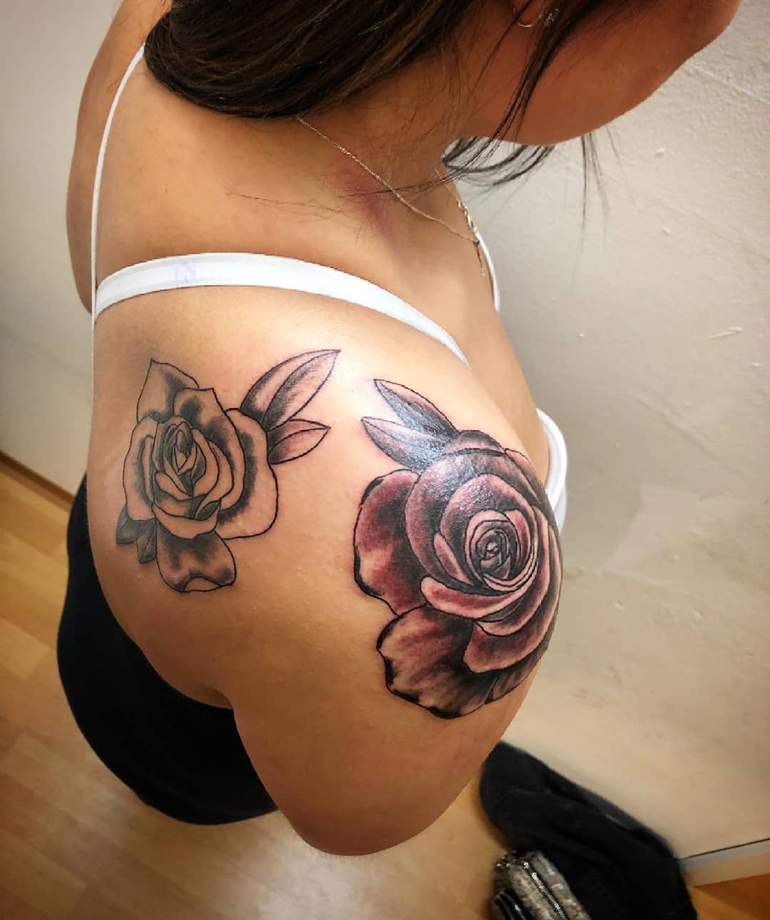 Image of rose shoulder tattoo in pair