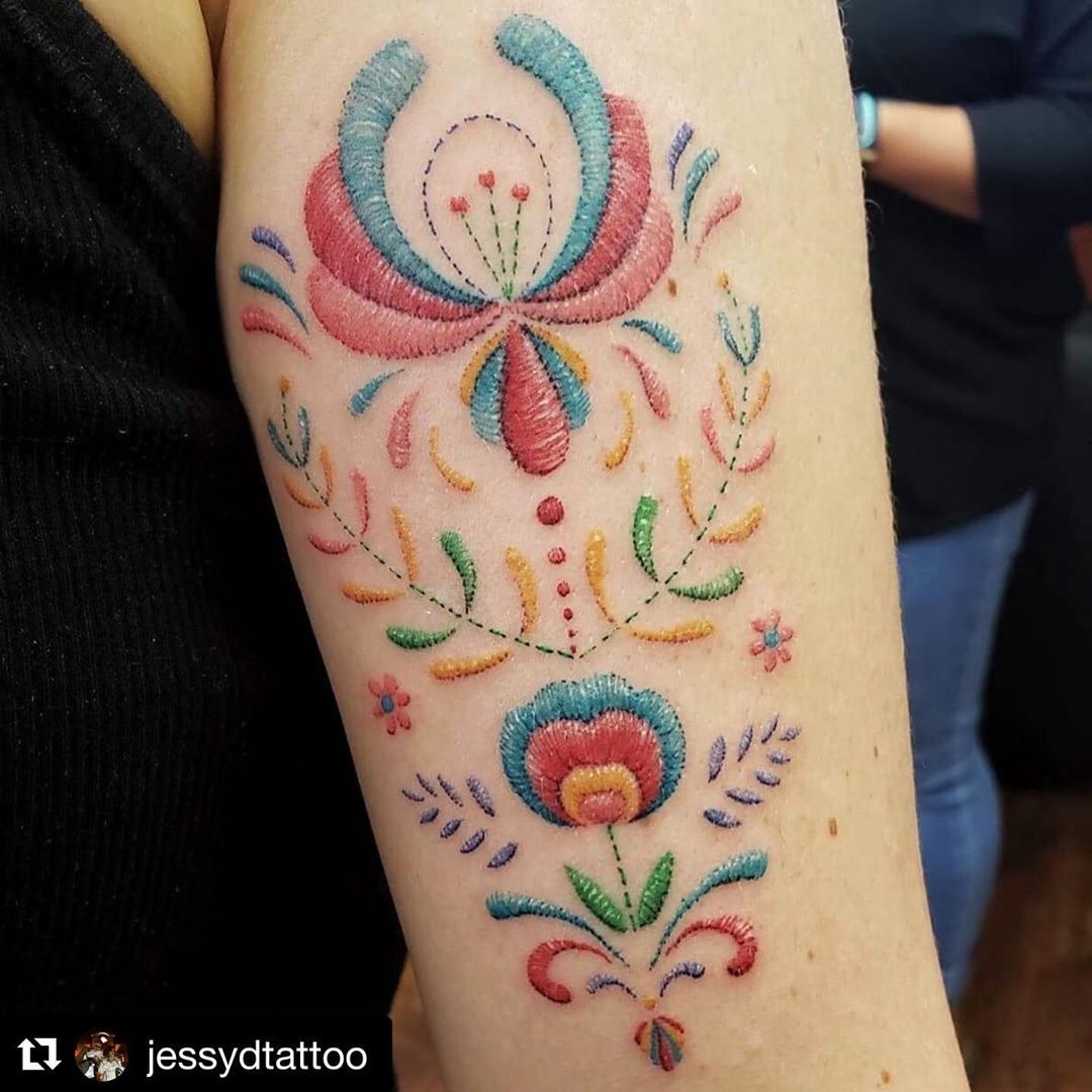 Impressive image of an embroidery tattoo