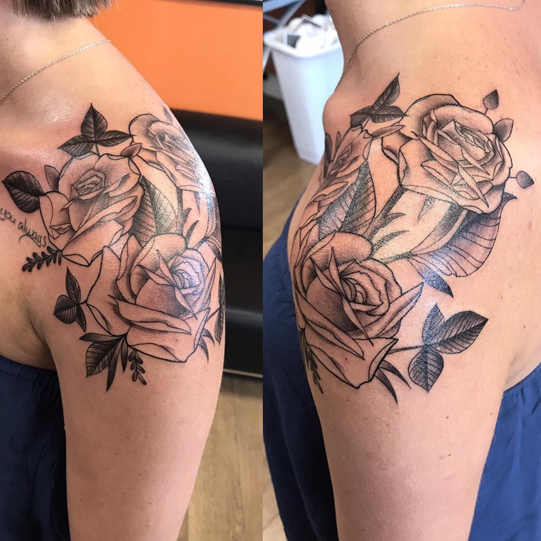 Image of three rose shoulder tattoos