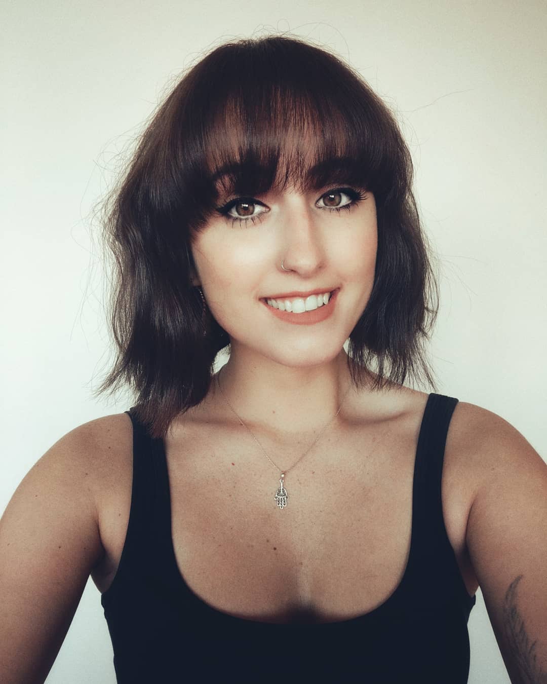 Image of woman with short hair with bangs hairstyle