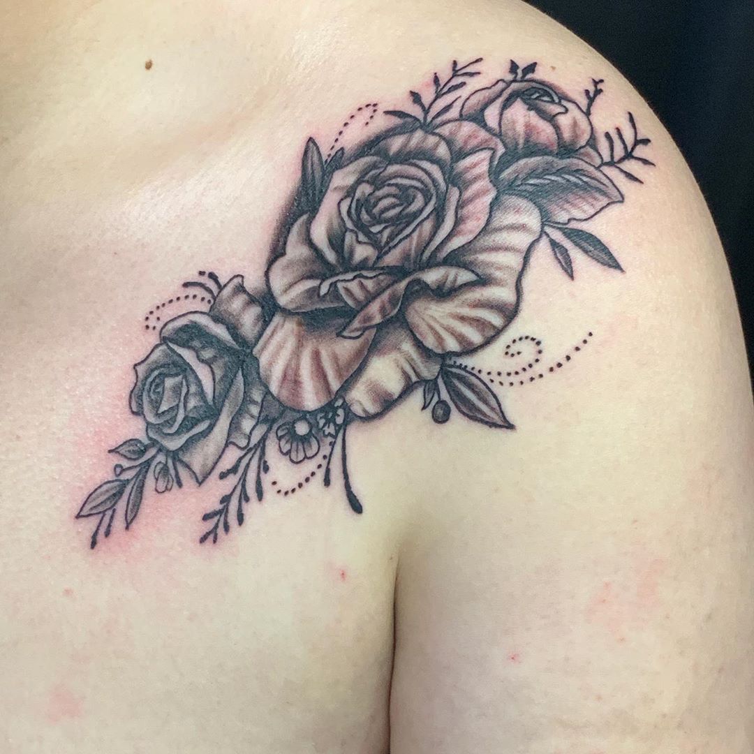Image of ornate rose shoulder tattoo