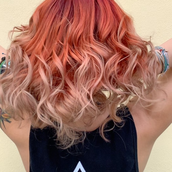 Image of a red to blonde ombre hairstyle