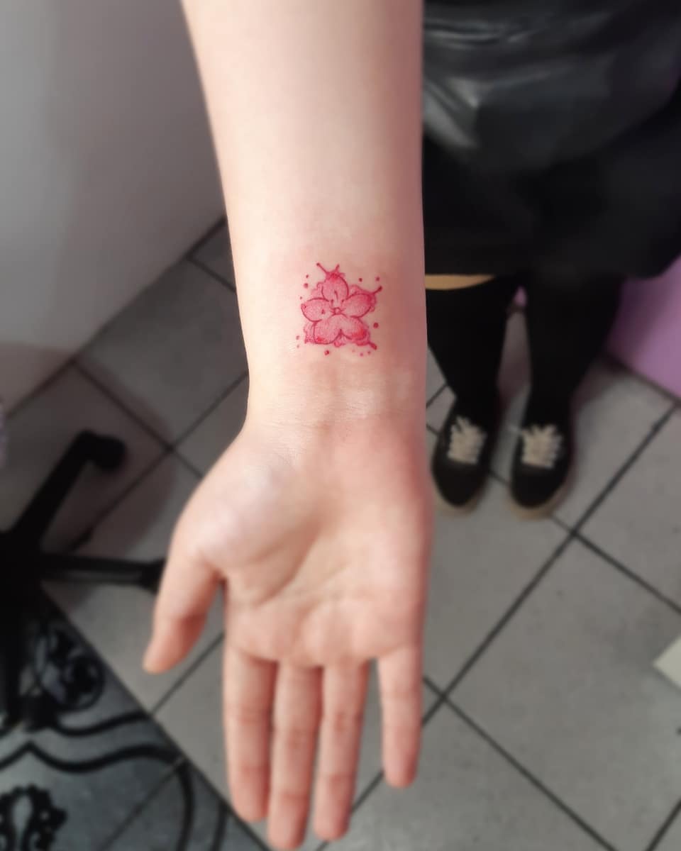 Sakura tattoo on inner wrist