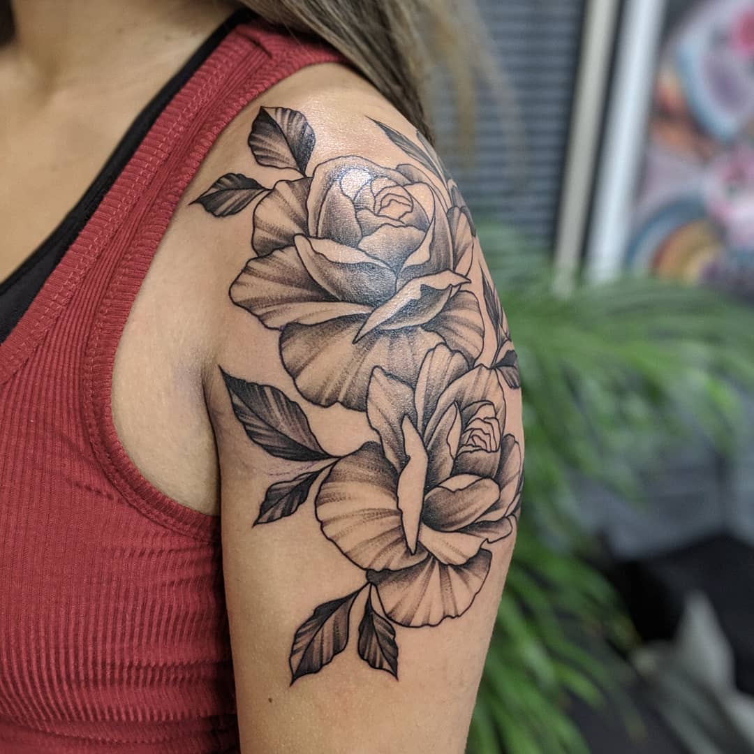 Very detailed shading on Image of rose shoulder tattoo