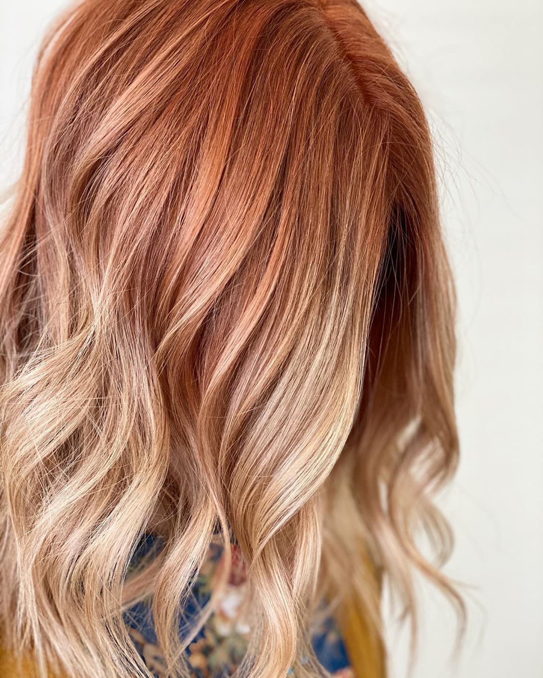 Image of a red to blonde ombre hairstyle