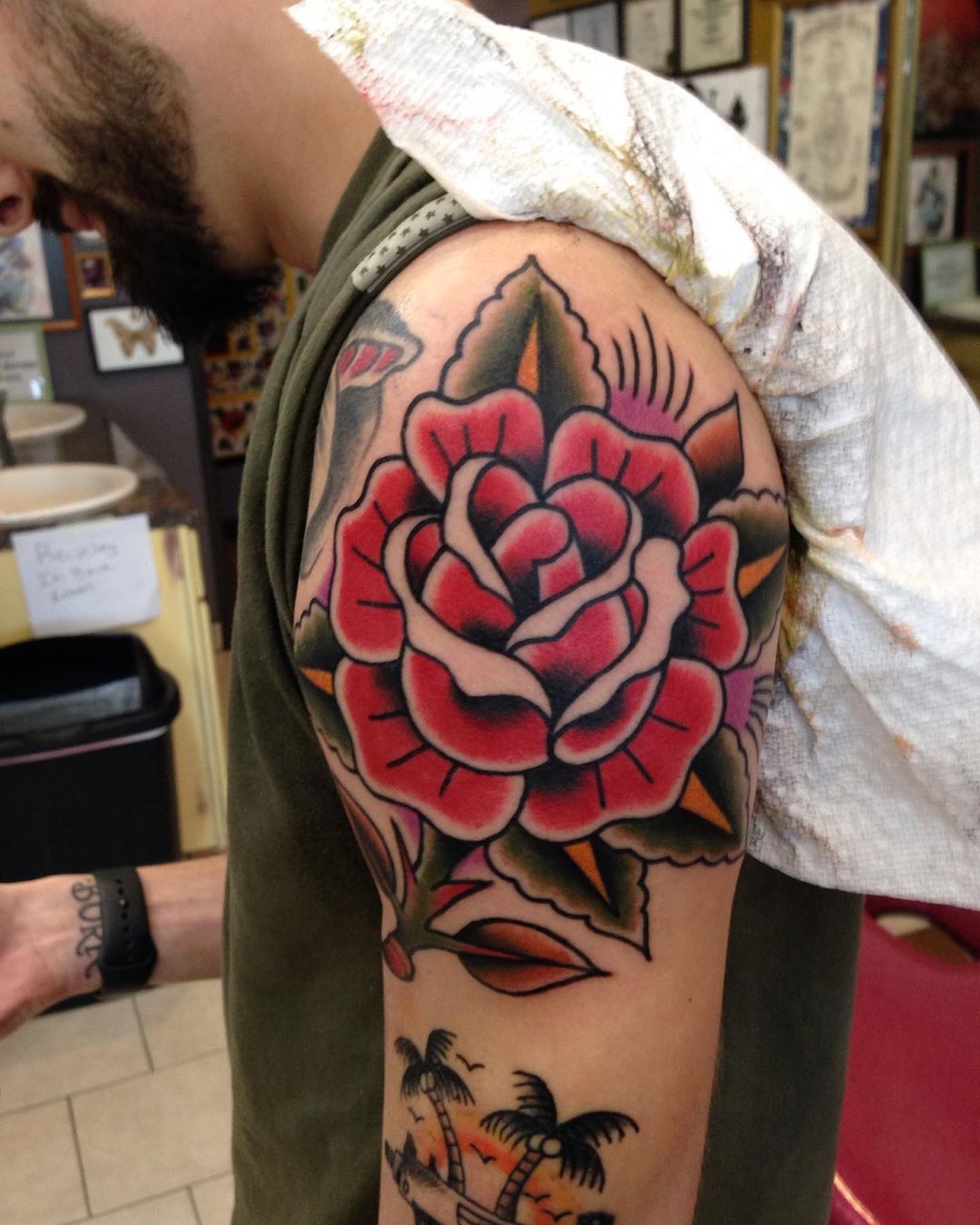 Image of rose shoulder tattoo for a man