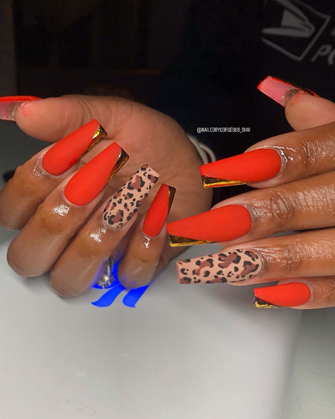 Image of cheetah nails design