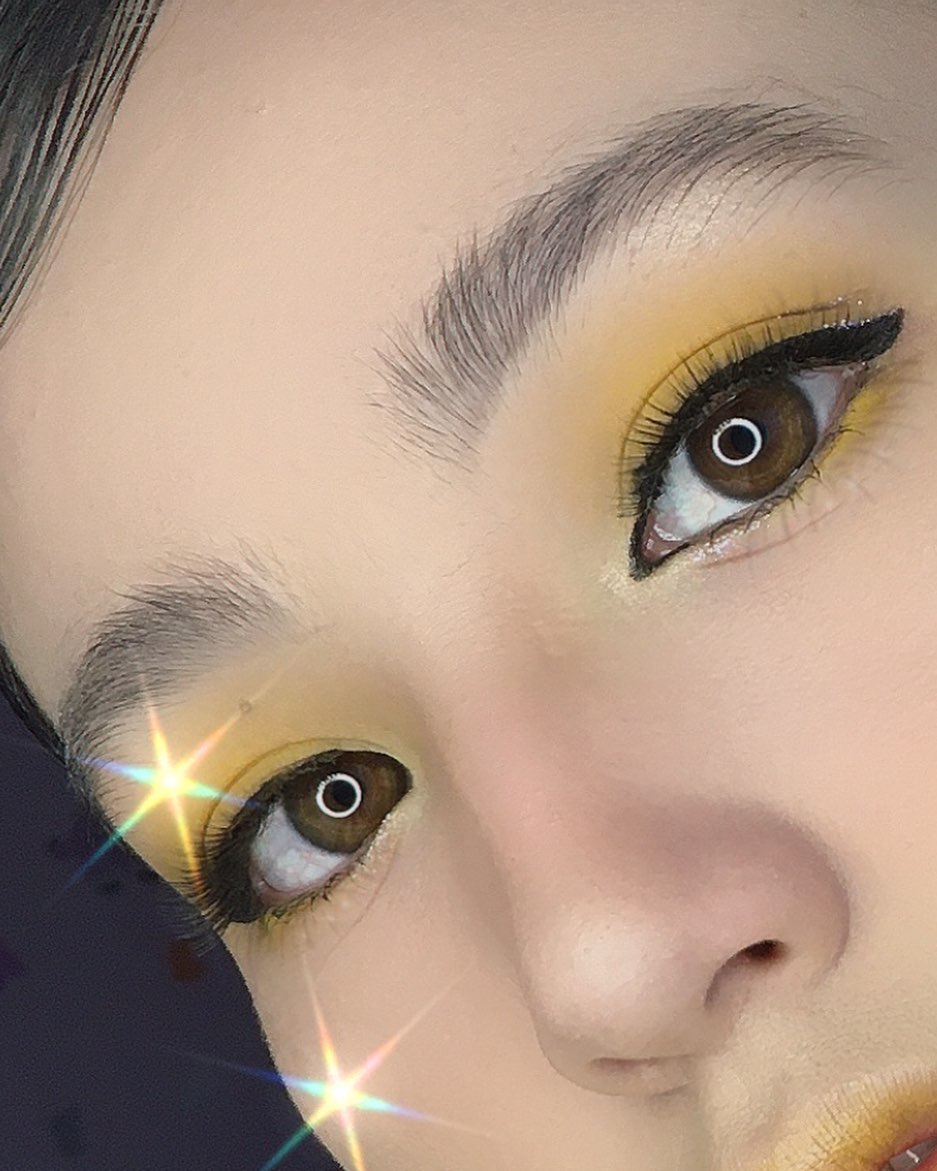 Inspirational image of yellow eye shadow makeup looks.