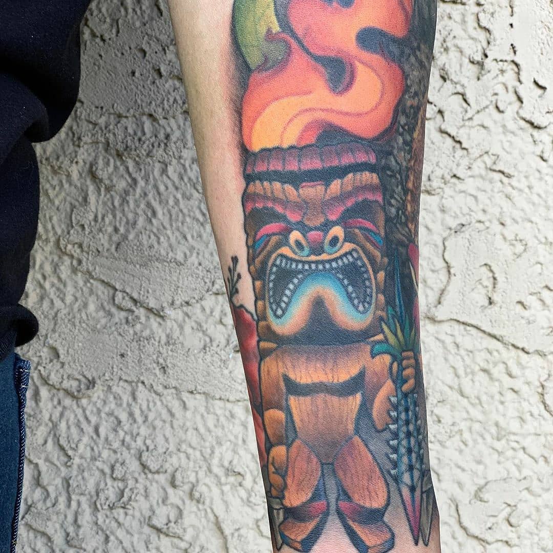 Colorful Hawaiian tiki tattoo