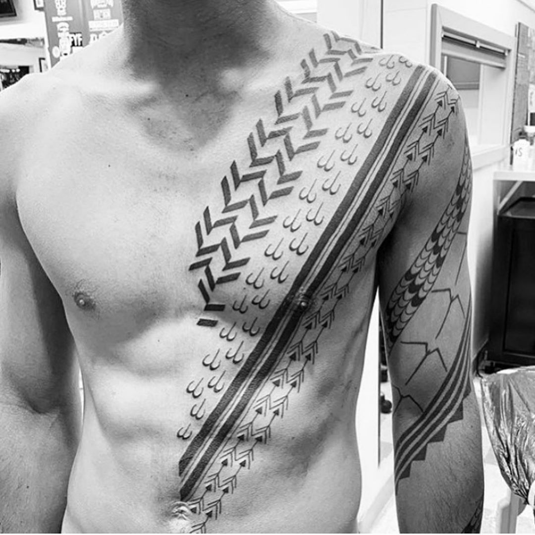 Tattoo on chest as sign of honor