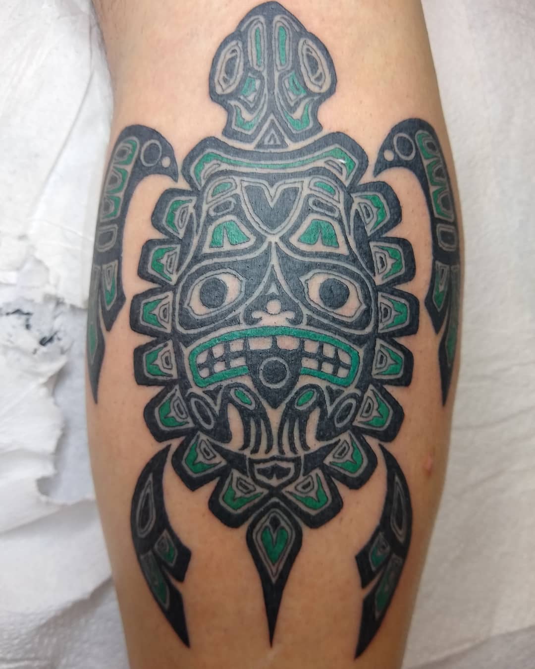 Tiki turtle tattoo