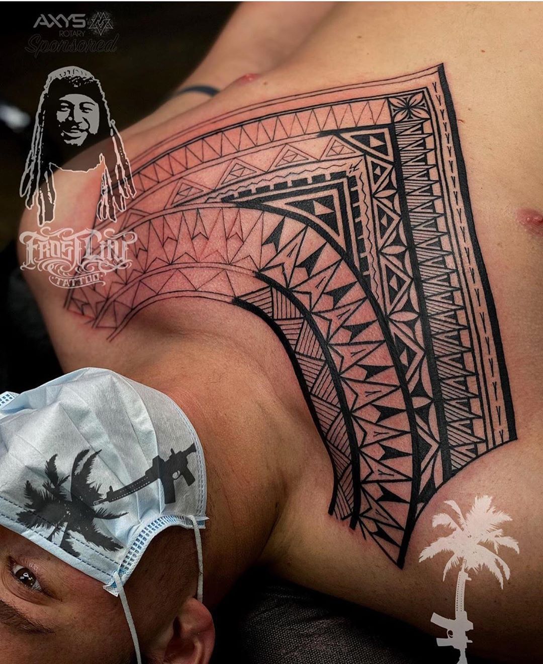 Patterned Hawaiian chest tattoo