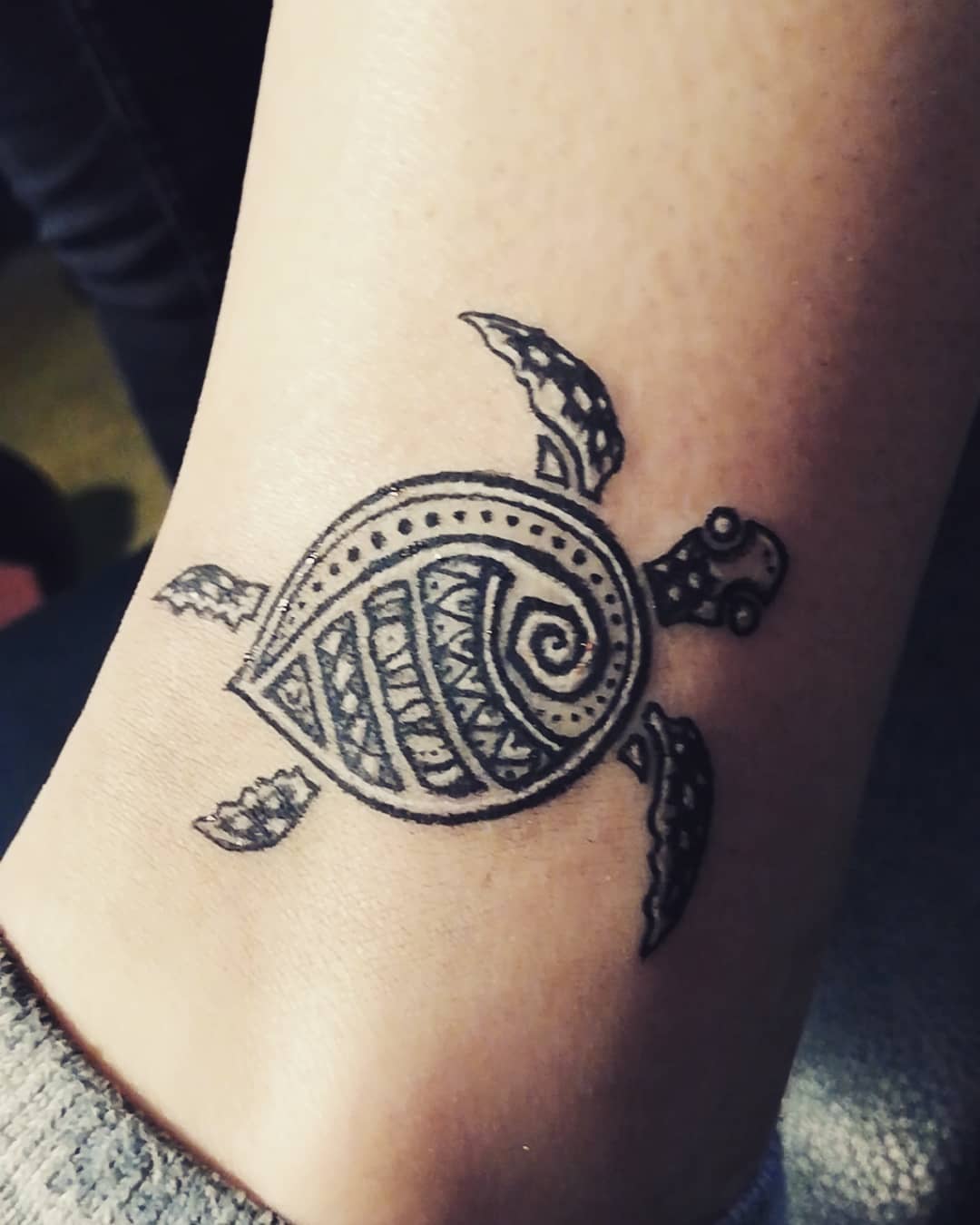 Spiral Sea Turtle Tattoo on ankle
