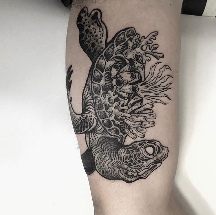 Coral reef inside magic sea turtle tattoo