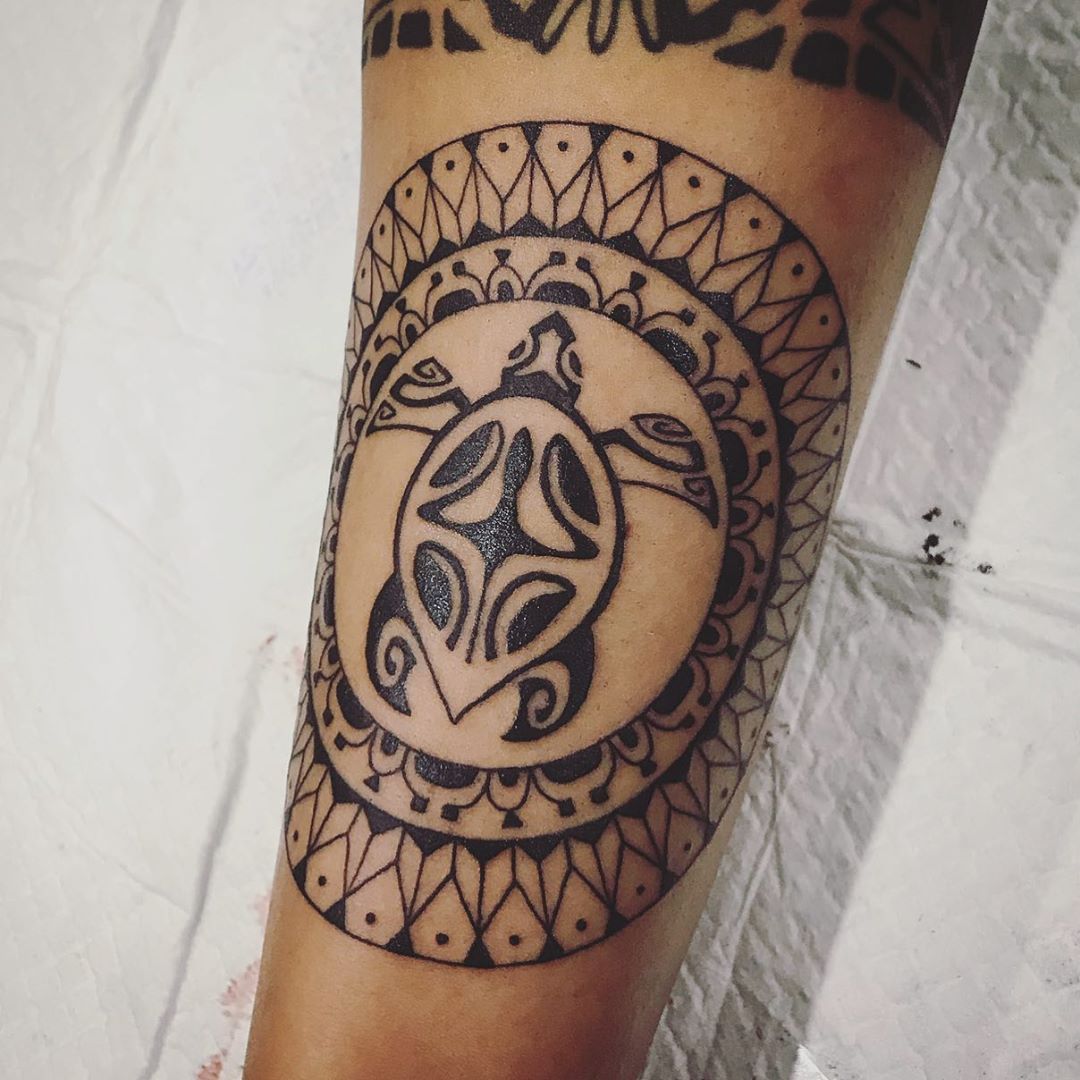 Tribal tattoo of sea turtle