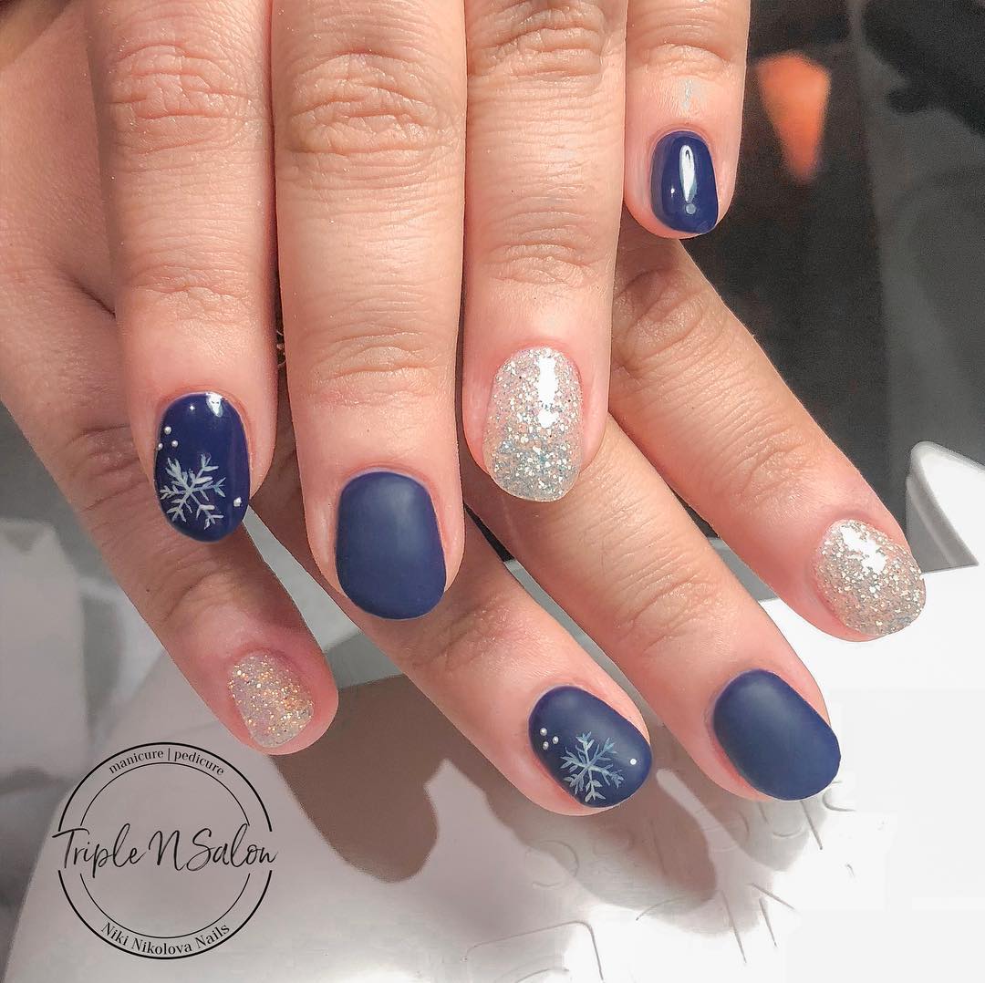 Image of navy blue Christmas nail designs