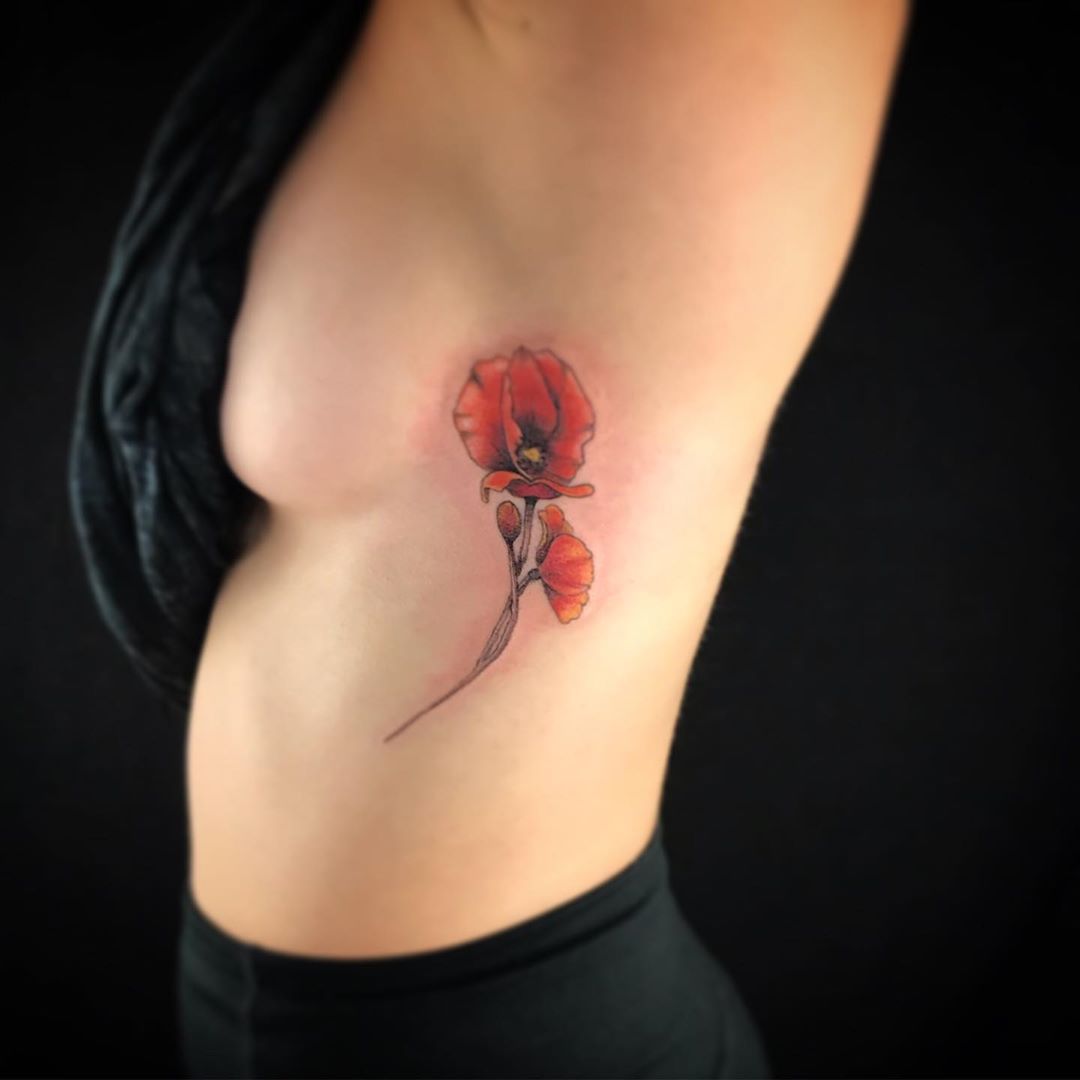 Impressive image of poppy tattoo
